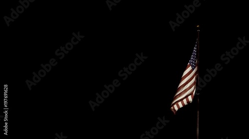 American Flag blowing in light breeze photo