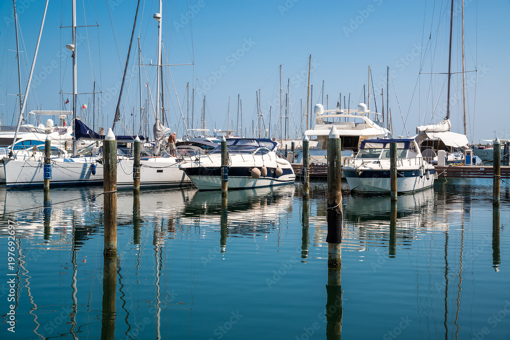 White yachts in the port are waiting. Rimini, Italy.