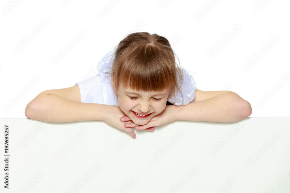 A girl is showing an advertisement on a white banner. A girl is showing an advertisement on a white banner.