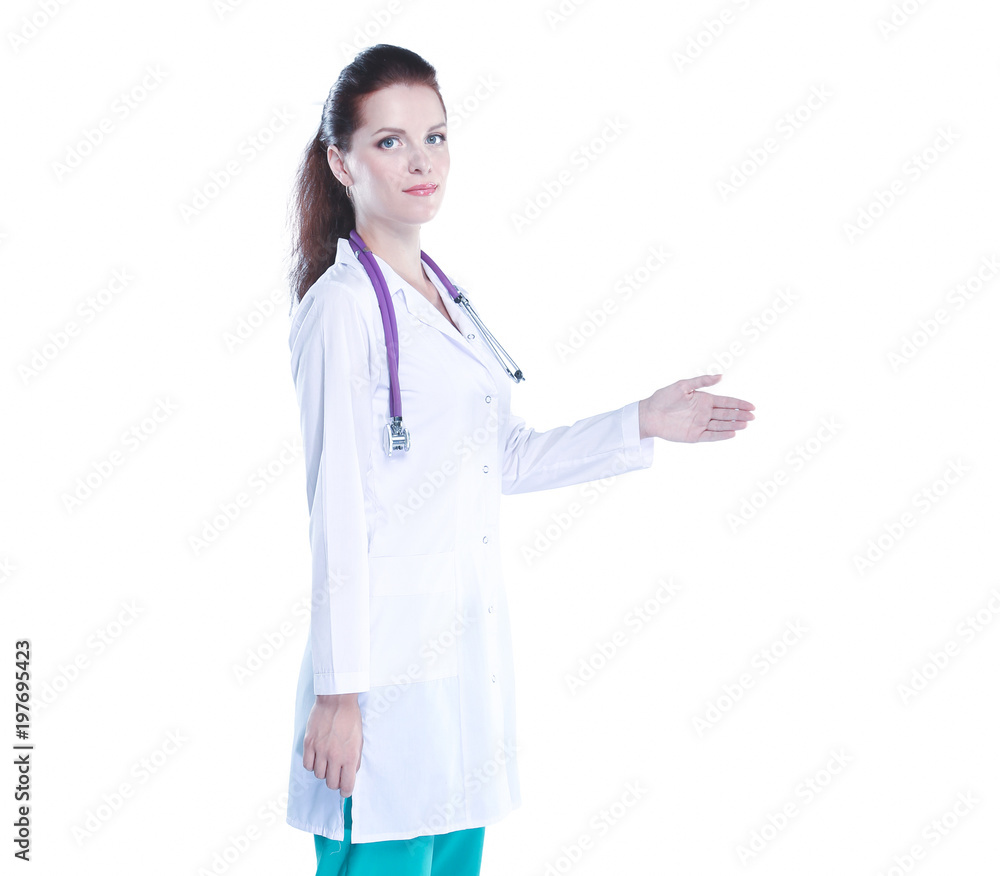 Smiling female doctor in uniform standing at hospital Smiling female doctor in uniform standing at hospital