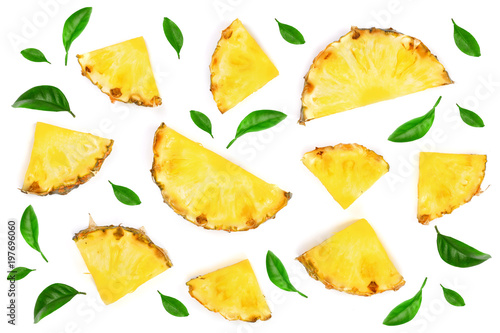 Sliced pineapple decorated with leaves isolated on white background. Top view. Flat lay pattern