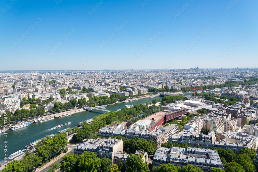 View of skyline Paris from top view. Cityscape of Paris from Eifel tower.  Cityscape and Seine river from top view at Eifel tower. 