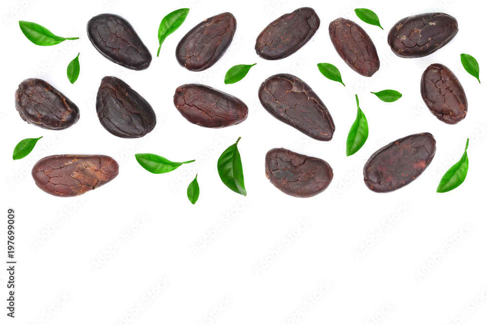 Obraz premium cocoa bean decorated with leaves isolated on white background with copy space for your text. Top view. Flat lay