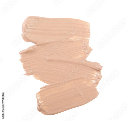 Beige liquid foundation makeup isolated on white background