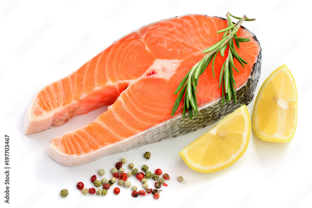 Slice of red fish salmon with lemon, rosemary and peppercorns isolated on white background Slice of red fish salmon with lemon, rosemary and peppercorns isolated on white background