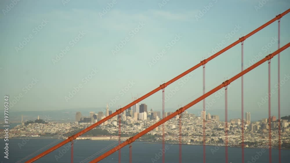 San Francisco seen through ropes of Golden Gate San Francisco seen through ropes of Golden Gate