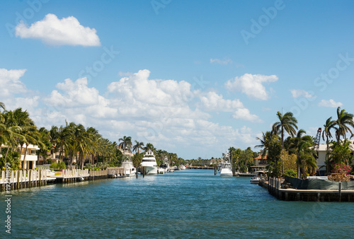 Waterfront homes and yachts on one of the channels on New River in Ft Lauderdale