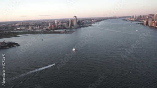 New York City daytime aerial view of Lower Manhattan and the Staten Island Ferry