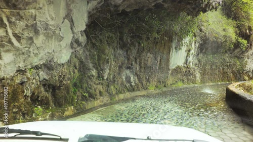 Experience the thrill of driving your car under a breathtaking small waterfall in the Ecuadorian Andes,near Rio Verde and Banos de Agua Santa.