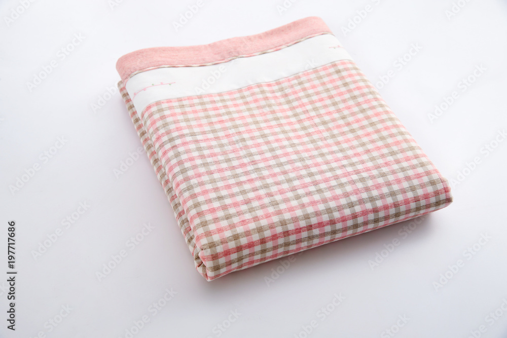 red and white checkered tablecloth on white background red and white checkered tablecloth on white background