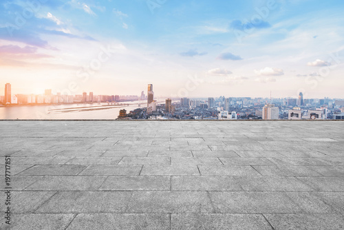 empty marble floor with cityscape and skyline in cloud sky © 安琦 王
