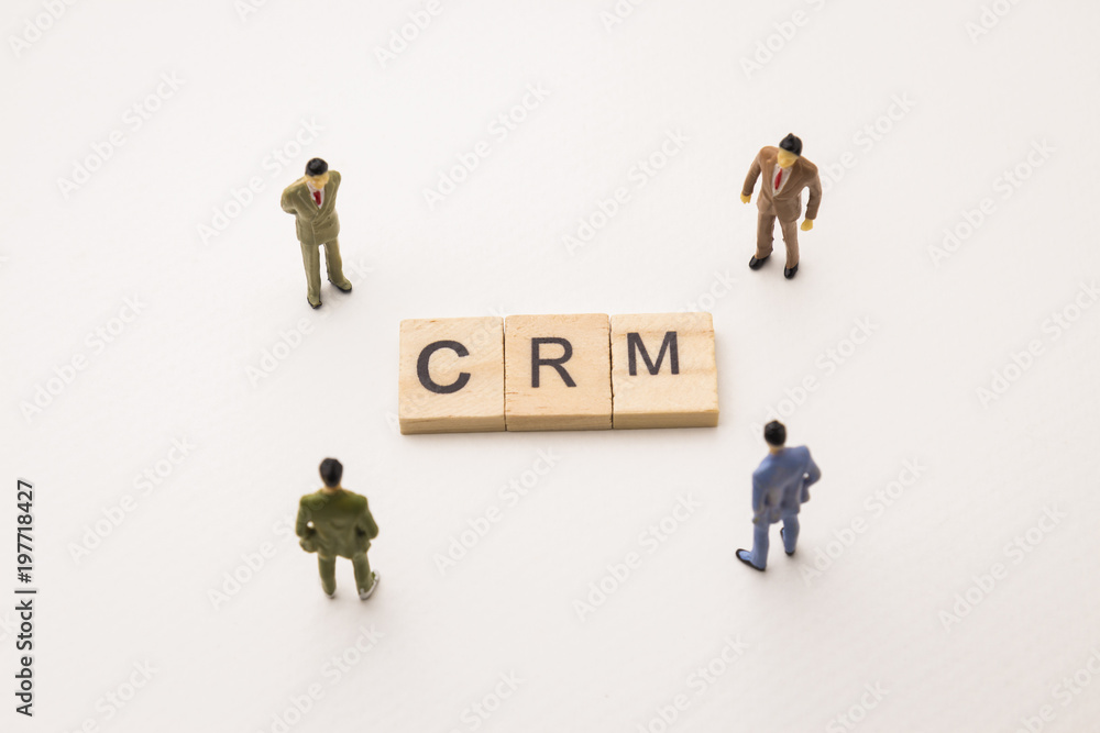 businessman figures meeting on crm conceptual businessman figures meeting on crm conceptual
