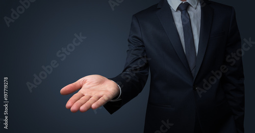 Businessman handing something without concept
