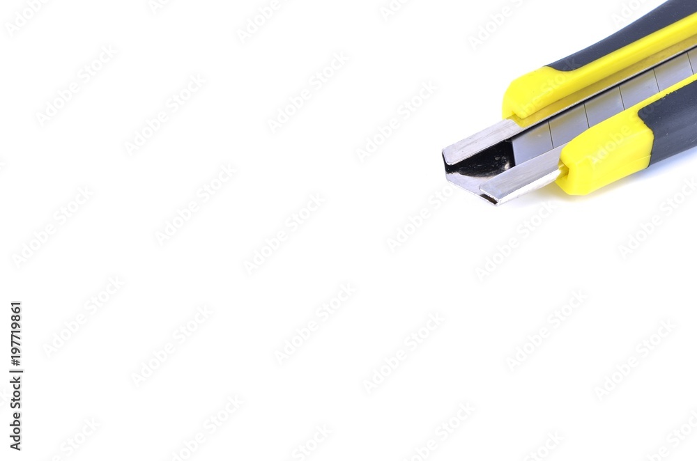 Yellow snap-off blade knife on white background. Yellow snap-off blade knife on white background.