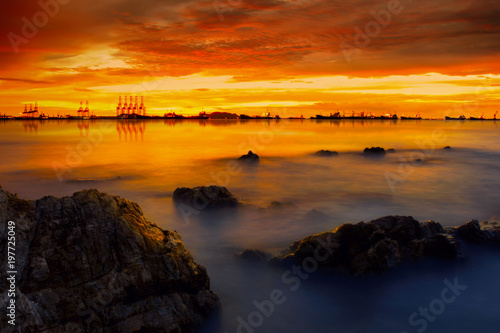 landscape sea around corgo container yard port at twilight sky.