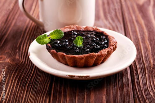 Blueberry and jam mini tart