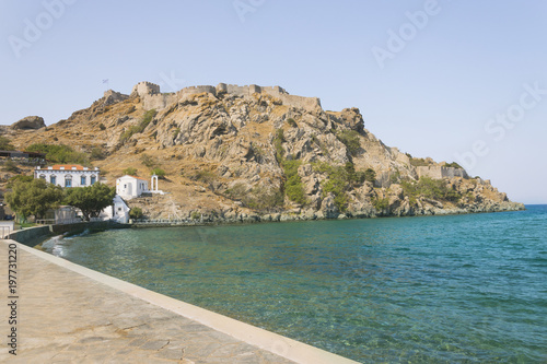 Limnos fortress on rocks with seaside view. Myrina city bay under medieval stronghold on Greek island.