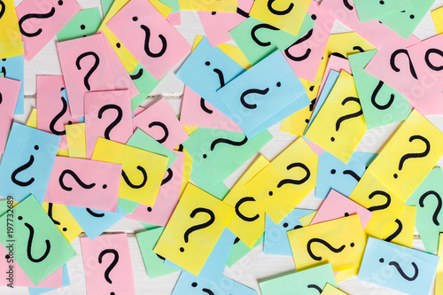 colorful paper notes with question marks. Closeup photo