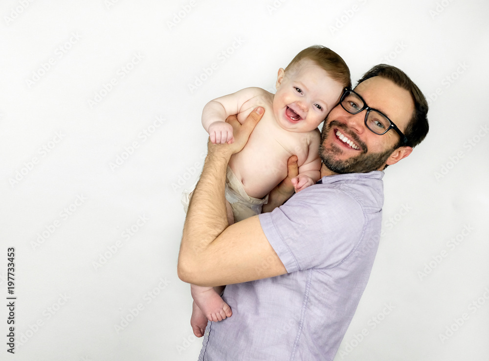 Young father holding his baby son Young father holding his baby son