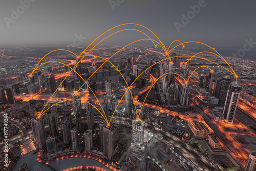 Development of internet web networks across the modern town photo