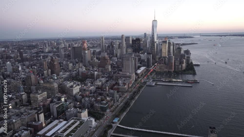 New York City aerial view of Manhattan at dusk from the Hudson River ...