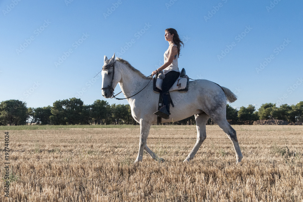 Woman astride Woman astride