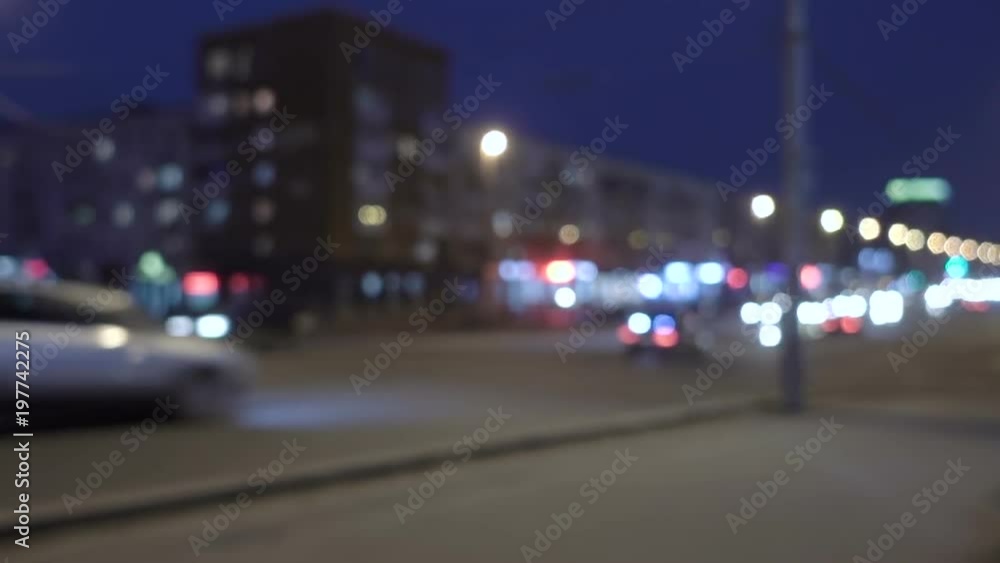 Defocused lights Los Angeles street abstract . City blur background. Moving bokeh circles of night traffi Defocused lights Los Angeles street abstract . City blur background. Moving bokeh circles of night traffi