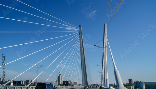 Close up of cable stayed bridge against blue sky