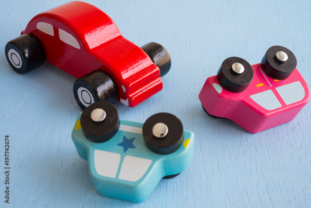 Colorful wooden car crash - Traffic accident auto insurance concept Colorful wooden car crash - Traffic accident auto insurance concept