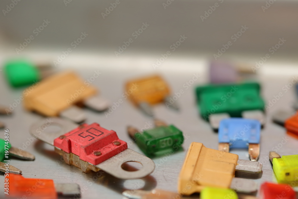 Automotive fuses come in different colors and each color is responsible for the specific value of the protection defined in amperes. Automotive fuses come in different colors and each color is responsible for the specific value of the protection defined in amperes.