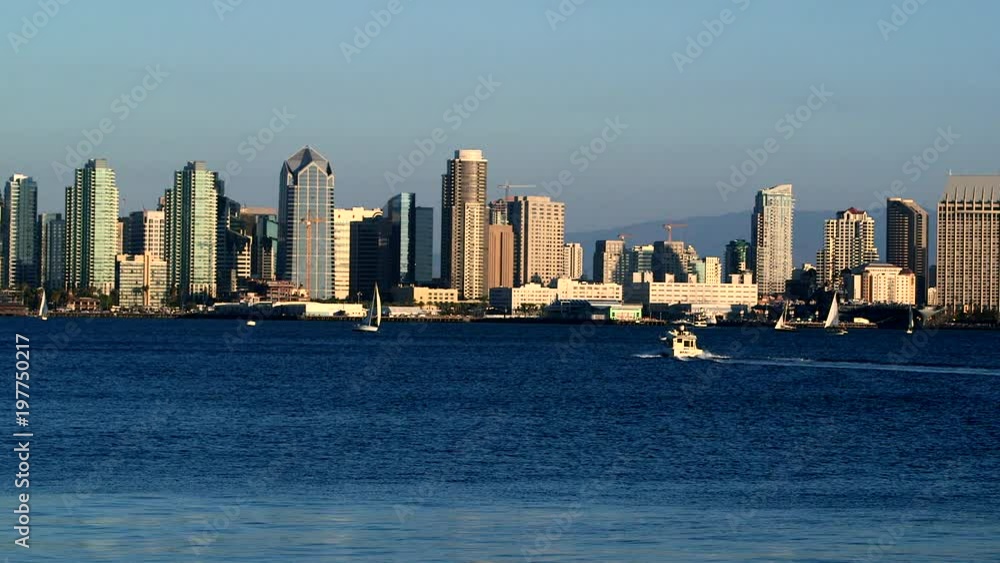 San Diego Bay with downtown skyline with boats sailing in the foreground San Diego Bay with downtown skyline with boats sailing in the foreground