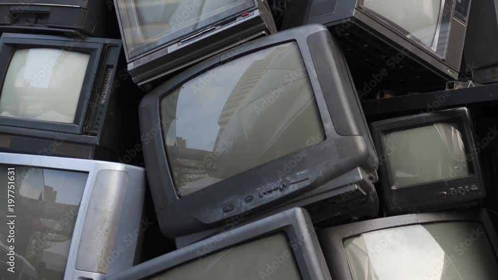 Tilt up VDO of old television, electronic junk, garbage, rubbish. Video