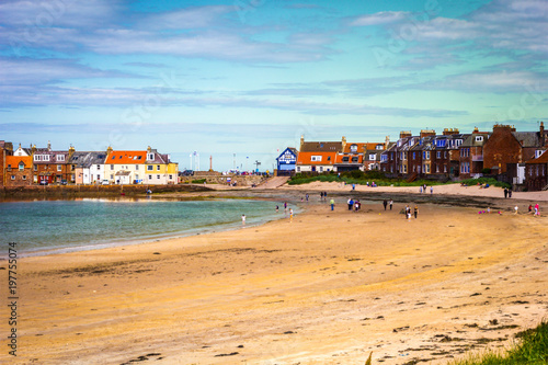 Obraz na płótnie North Berwick beach and tourists walking on the sand, East Lothian w salonie