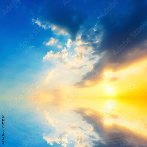 Background sky during sunset and water reflections © Sky Stock