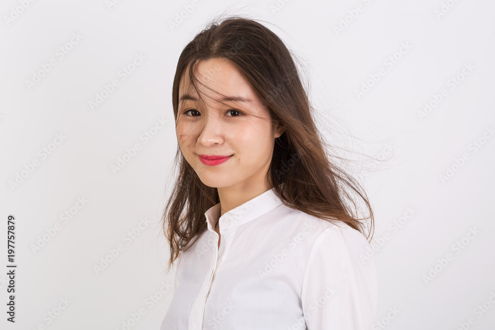 Portrait of Beautiful Business Woman Wearing White Shirt. Smiling Young Asian Business Woman. Portrait of Beautiful Business Woman Wearing White Shirt. Smiling Young Asian Business Woman.