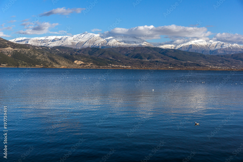 Amazing panoramic Landscape of Lake Pamvotida and Pindus mountain from city of Ioannina, Epirus, Greece Amazing panoramic Landscape of Lake Pamvotida and Pindus mountain from city of Ioannina, Epirus, Greece
