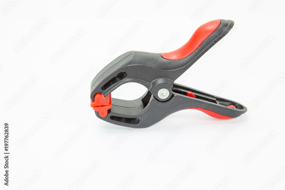 Plastic spring clamp on white background, Isolated. Plastic spring clamp on white background, Isolated.
