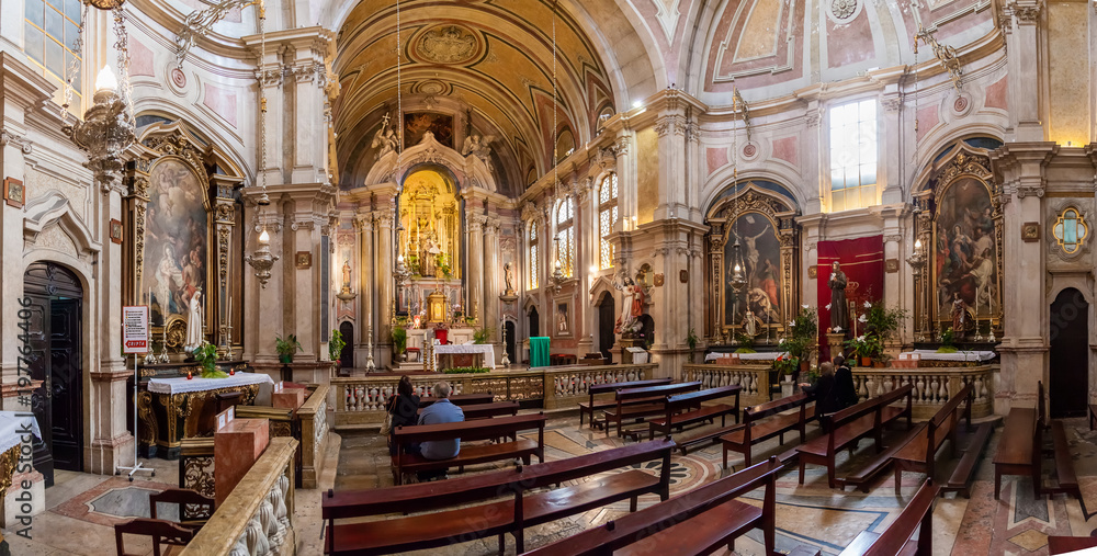 Fototapeta premium Lisbon, Portugal - October 24, 2016: Santo Antonio de Lisboa Church interior. Built on the Saint Anthony of Lisbon aka of Padua or Padova birth location. View of Nave and Chapels in Baroque style.