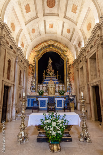 Fototapeta Naklejka Na Ścianę i Meble -  Lisbon, Portugal - October 24, 2016: Close up of the altar of the Igreja da Conceicao Velha or Old Our Lady of the Conception Church. View of Nave and Chapels. Renaissance, Mannerist and Baroque style