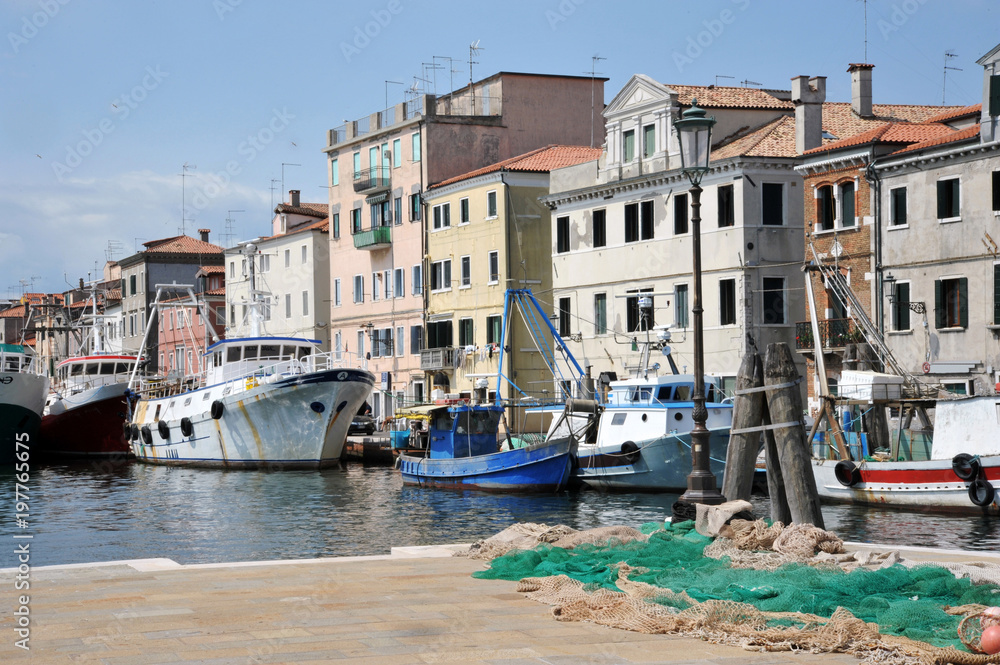 Chioggia, Venice, Italy: canal in the old town with bridge and boats