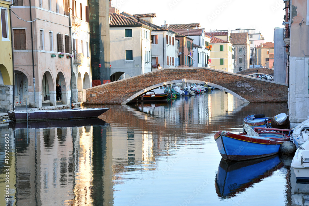 Chioggia, Venice, Italy: canal in the old town with bridge and boats