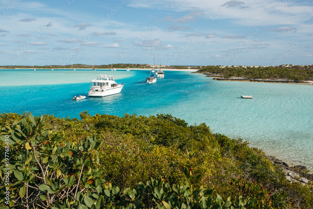 A lineup of cruising boats at Warderick Wells in the Bahamas.