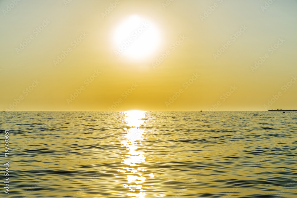 Obraz premium Sunset over the Mediterranean sea in summer in Sicily, Italy