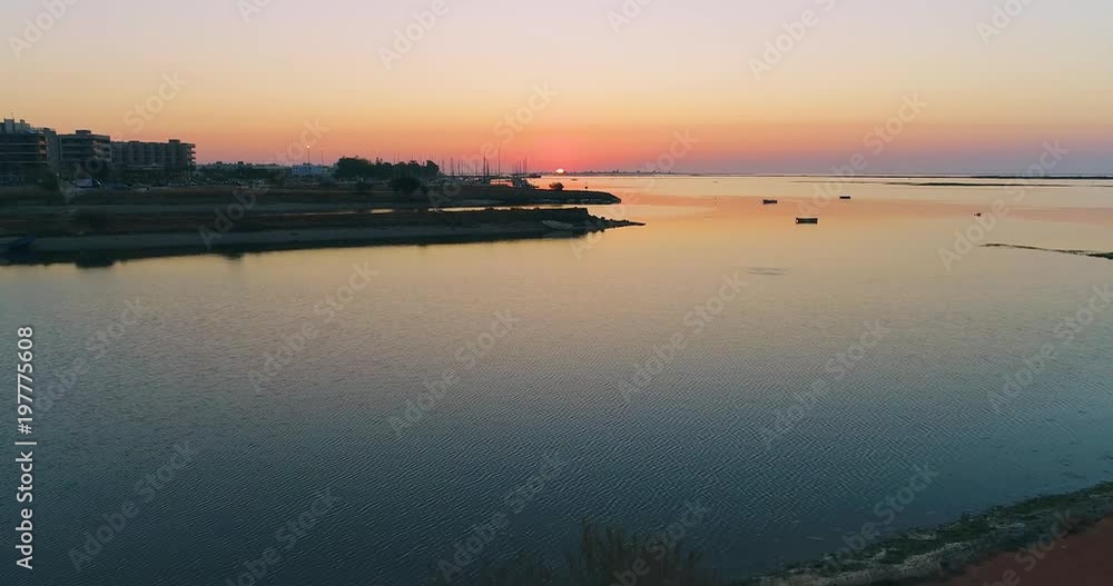 Sunrise aerial seascape view of Olhao waterfront to Ria Formosa natural park. Algarve. Sunrise aerial seascape view of Olhao waterfront to Ria Formosa natural park. Algarve.
