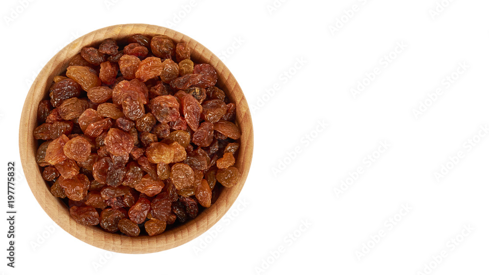 delicious and healthy raisins in hand in wooden bowl isolated on white background, healthy sweet snack. copy space, template delicious and healthy raisins in hand in wooden bowl isolated on white background, healthy sweet snack. copy space, template