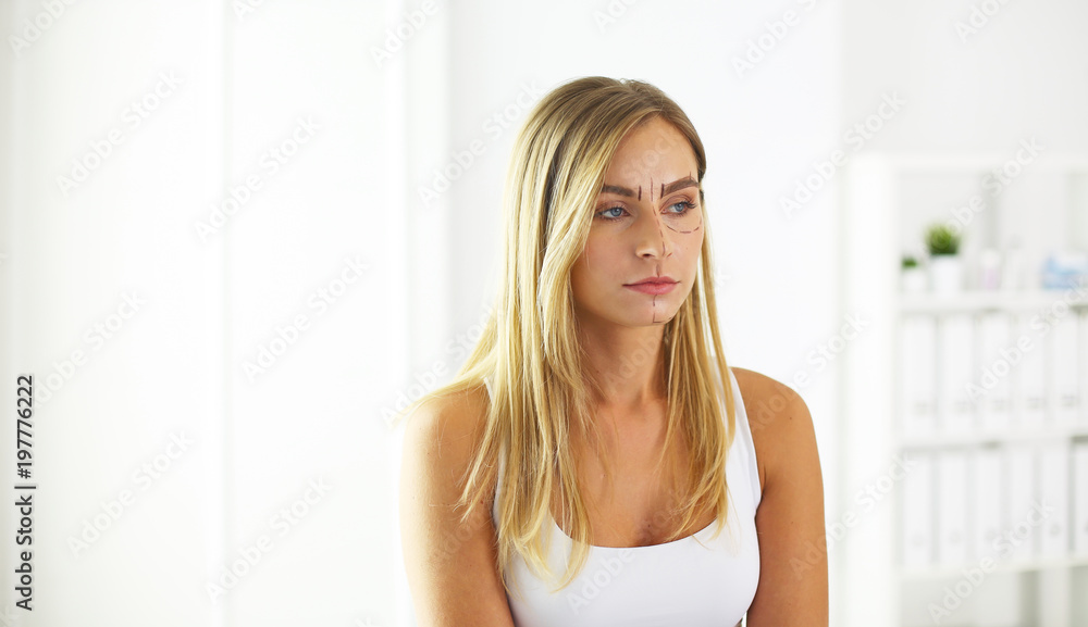 Permanent Makeup For Eyebrows. Beautiful Woman With Thick Brows In Beauty Salon. Beautician Doing Eyebrow Tattooing For Female Face. Beauty Procedure Permanent Makeup For Eyebrows. Beautiful Woman With Thick Brows In Beauty Salon. Beautician Doing Eyebrow Tattooing For Female Face. Beauty Procedure