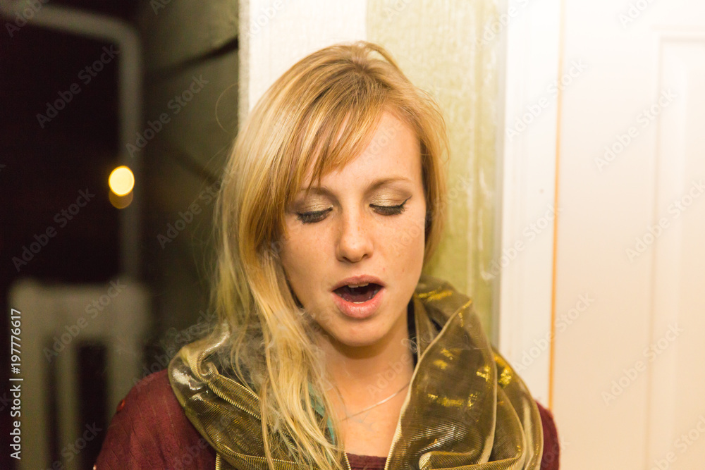 Fototapeta premium Beautiful Blonde Blowing Smoke