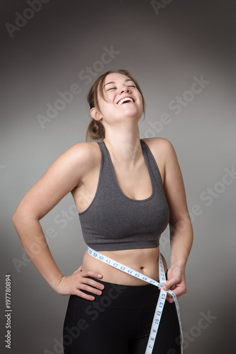 Obraz na płótnie fitness model on gray background w salonie