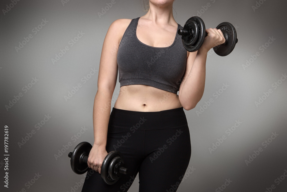 fitness model on gray background fitness model on gray background