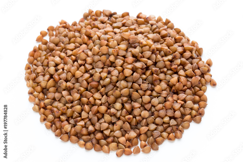 Buckwheat grains isolated on the white background. Buckwheat grains isolated on the white background.